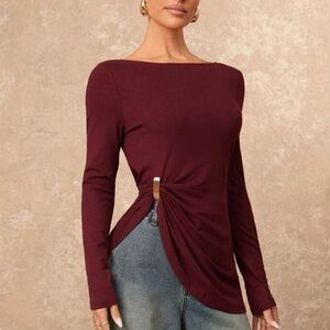 Burgundy long sleeve gold brooch detail top
